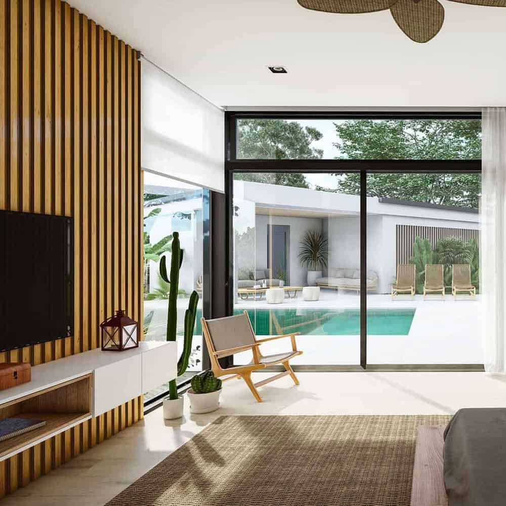 Remodeling professional reviewing structural plans and finish selections during detailed home renovation consultation